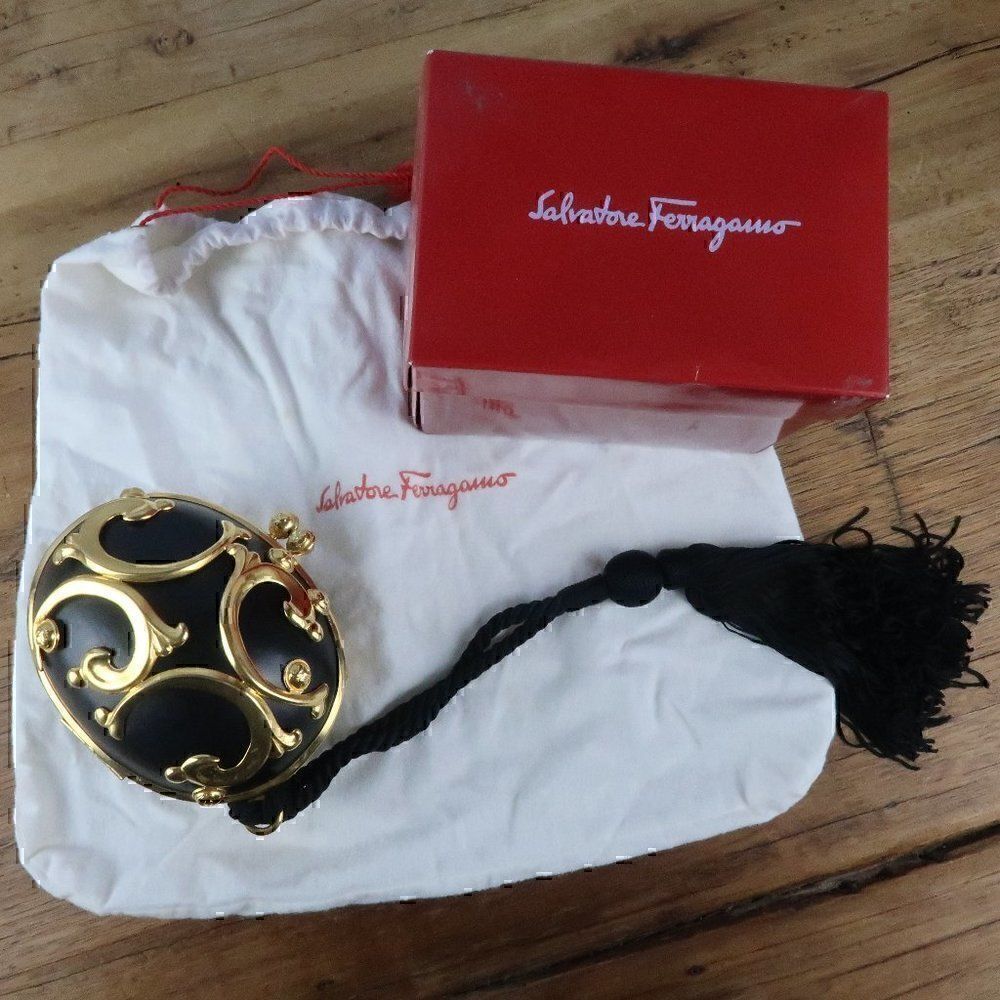 SALVATORE FERRAGAMO VINTAGE BLACK LEATHER & GOLD METAL EGG CLUTCH BAG W/TASSLE